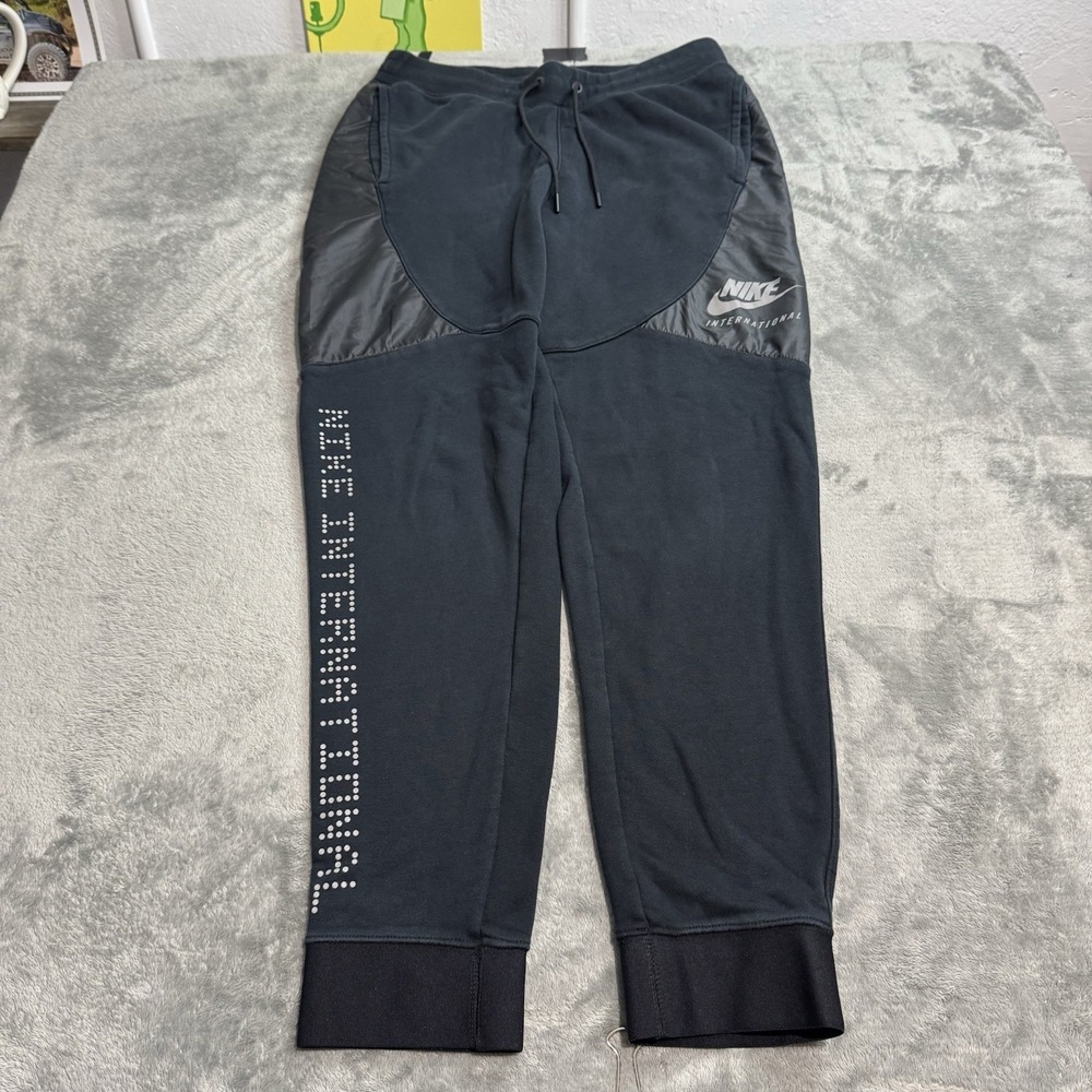 Nike International Tech Sweatpants Mens M Casual Gym Workout Performance Lounge